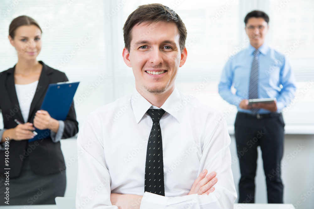 Happy businessman with team Happy businessman with team