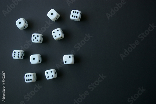 Many dice on black background