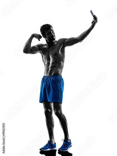 Fototapeta man fitness pround selfie silhouette