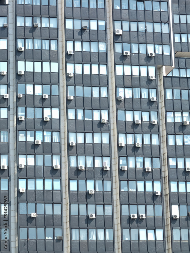 Modern office building with many air-conditioners