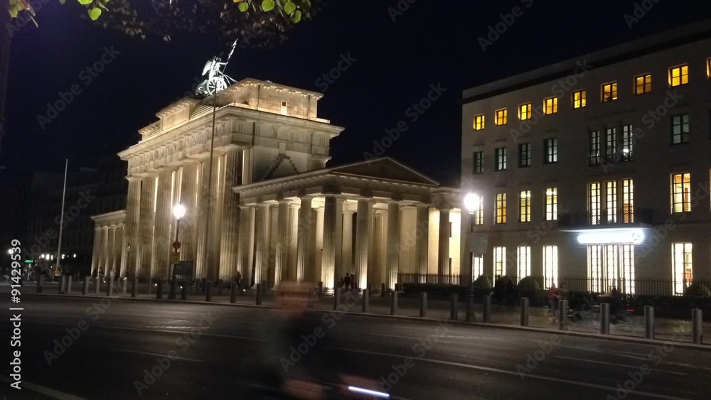 Time lapse of city traffic and pedestrians around Brandenburger Tor, Berlin, Germany Time lapse of city traffic and pedestrians around Brandenburger Tor, Berlin, Germany