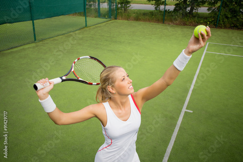 Woman in tennis practice © Kaspars Grinvalds