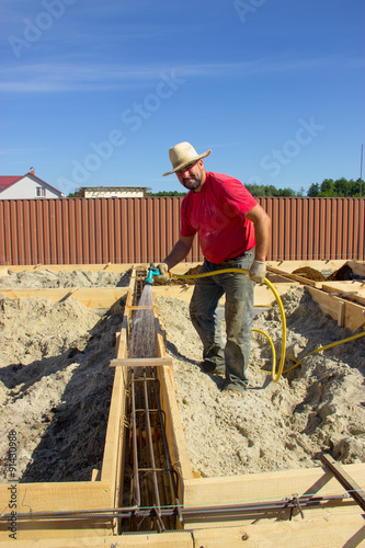 male construction worker working on the construction of the foun