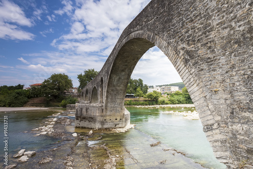 The Bridge of Arta is an old stone bridge that crosses the Arach © ververidis