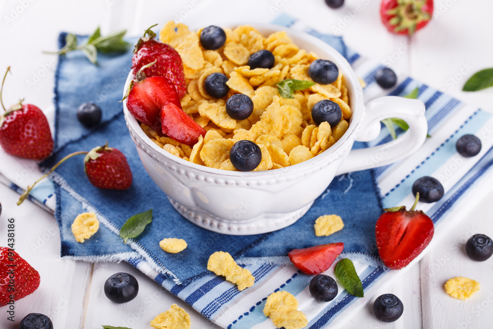 Corn flakes and fresh berries, for Breakfast. selective focus Corn flakes and fresh berries, for Breakfast. selective focus