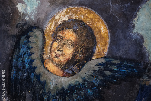 Image of a saint on frescoes photo