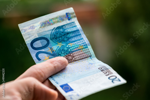 Man giving euro money