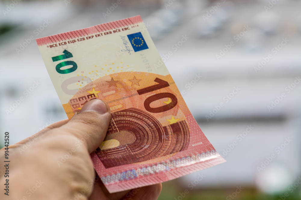 Man giving euro money