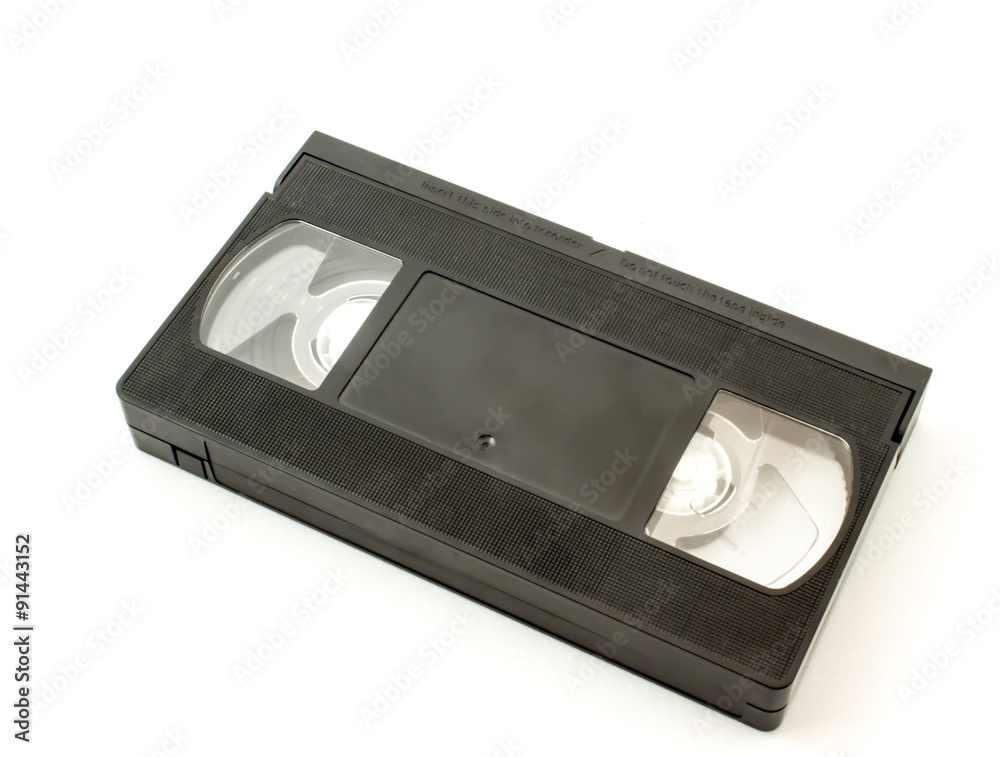 Old black magnetic videotape with the film