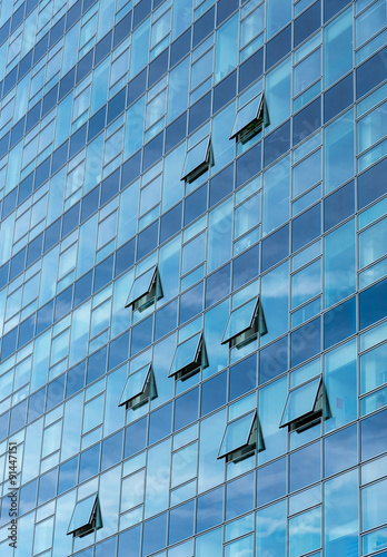 Architectural detail of a modern glass skyscraper building