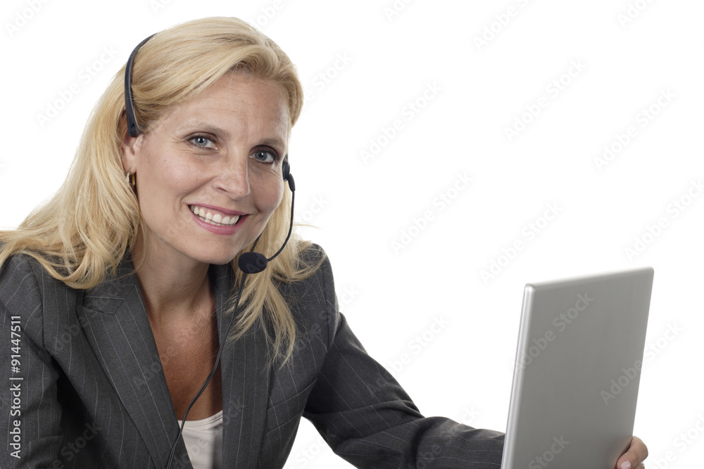 Woman with Headset and Laptop Smiles at Camera Woman with Headset and Laptop Smiles at Camera