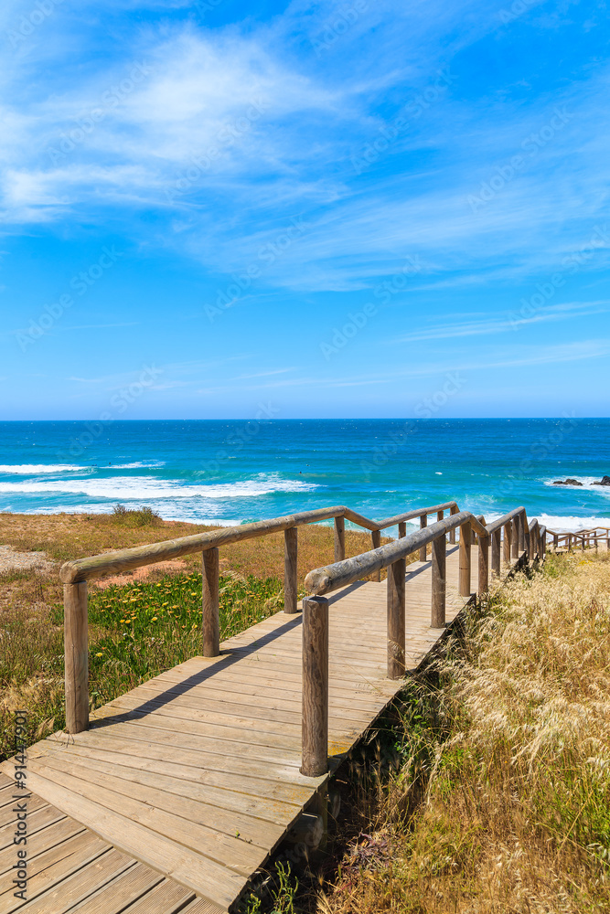 Wooden walkway to Praia do Amado beach, Algarve region, Portugal