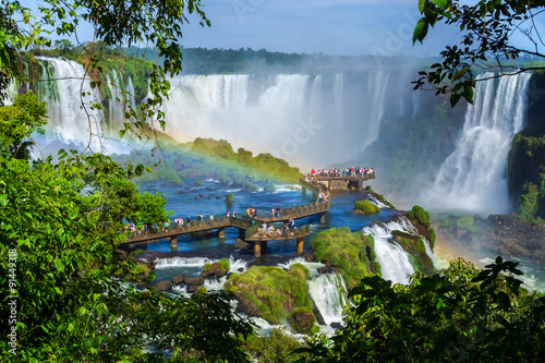Tourists at Iguazu Falls, on the border of Brazil, Argentina, and Paraguay. 