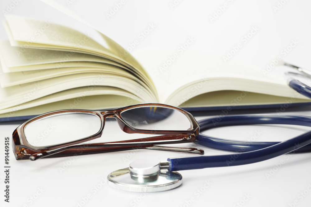 Book, Stethoscope and Glasses - Conceptual Book, Stethoscope and Glasses - Conceptual