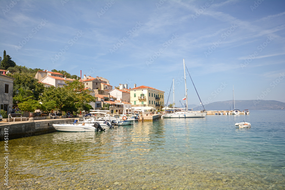 Cres Island, Croatia: View to the village Valun with harbor and sailing boats