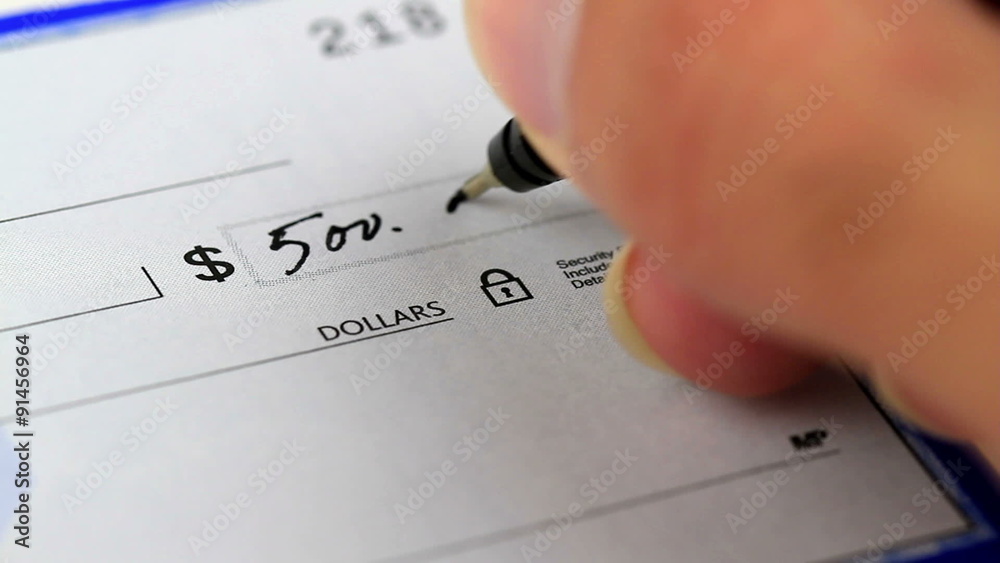 writing and signing a check for a large amount