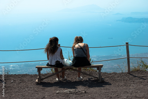 Two woman sitting front bay Naples © gigadesign