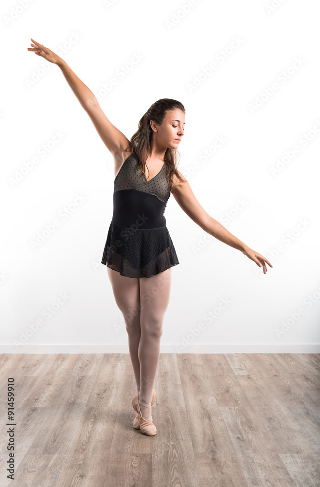 Beautiful girl ballet dancer in studio