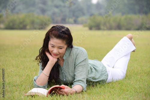 Elderly woman reading