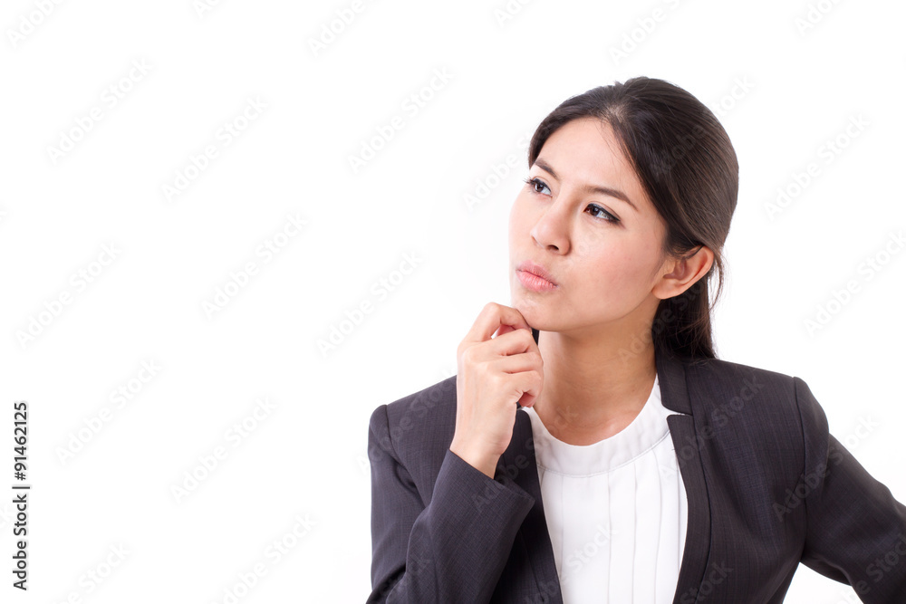 serious businesswoman thinking, looking up serious businesswoman thinking, looking up