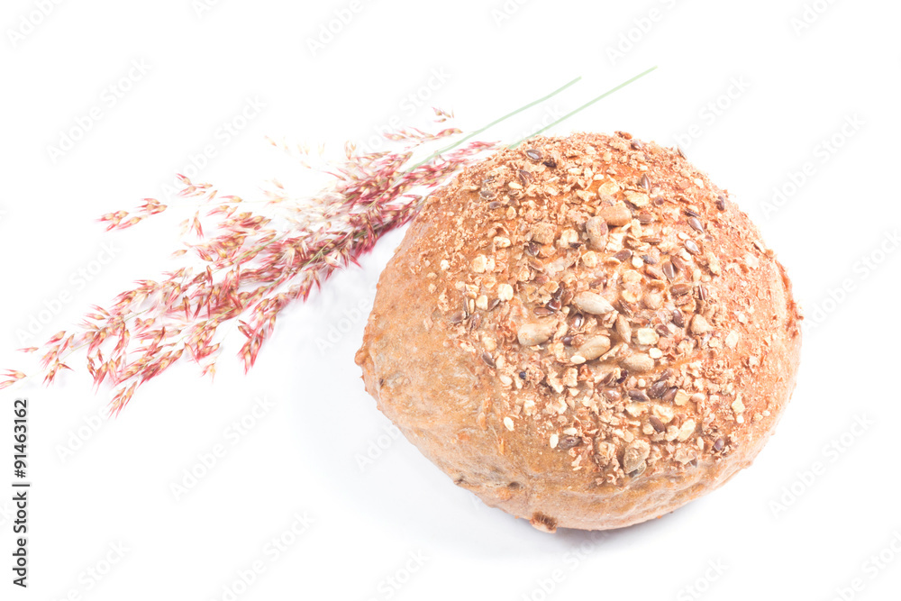 Fresh whole grain bread cut in half on white background
Fresh whole grain bread cut in half on white background