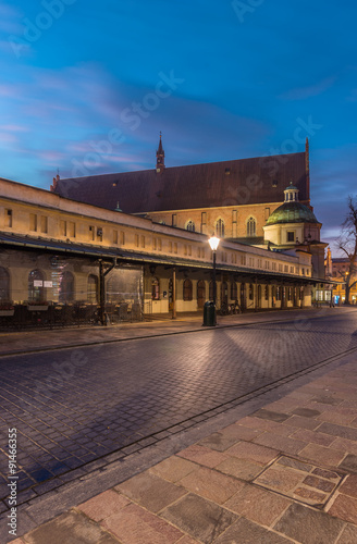 Krakow, Poland, main gate to the dominican monastery and gothic church of Holy Trinity, seen from Stolarska street in the morning. photo