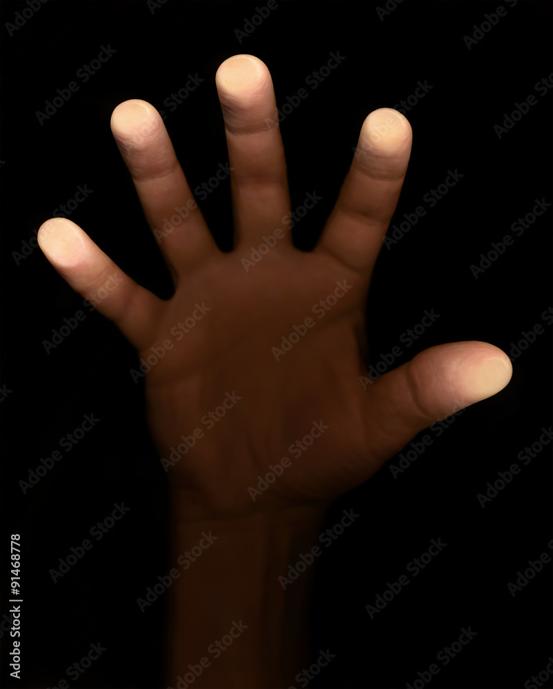 fingers touch the glass on a black background fingers touch the glass on a black background