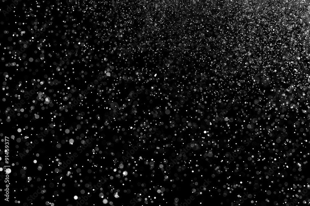 abstract splashes of water on a black background. abstract spray of water. abstract rain. shower water drops. abstract texture.