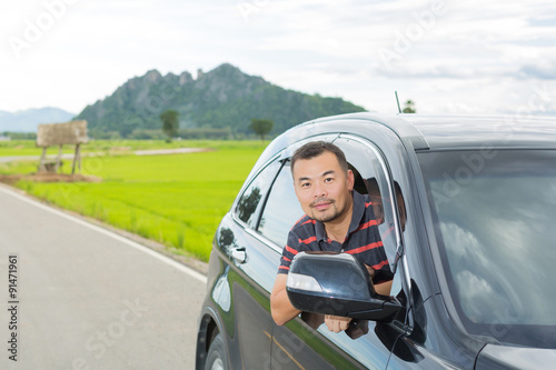 Asian man sitting in the car © markuso