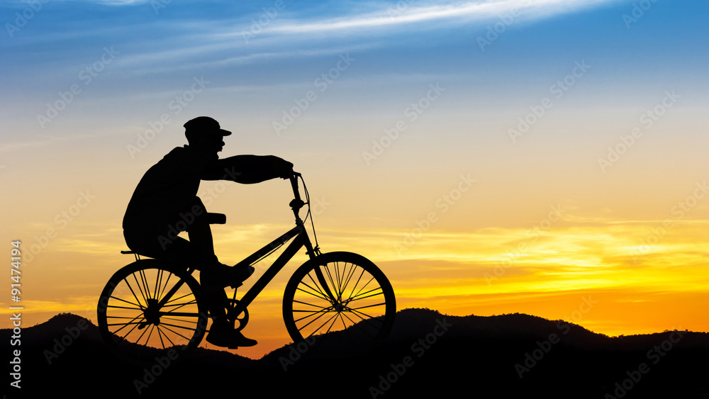 Fototapeta premium Man cycling at mountain