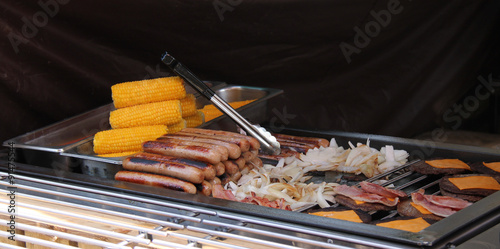 A Mix of Grilled Cooked Food on an Open Air Stove.