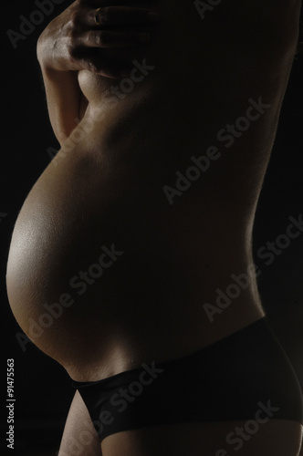 pregnant with black background