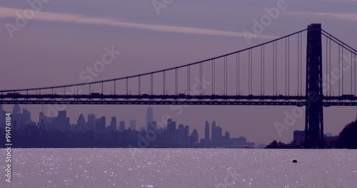 The George Washington Bridge connects New Jersey to New York state with the Manhattan skyline. photo