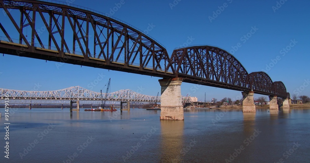 Bridges span the Ohio River near Louisville, Kentucky. Bridges span the Ohio River near Louisville, Kentucky.