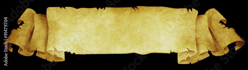 Antique parchment scroll on black background. photo