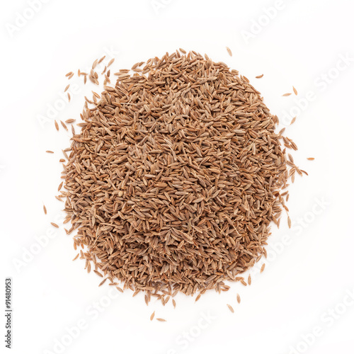 Top view of Organic Cumin seed (Cuminum cyminum) isolated on white background.