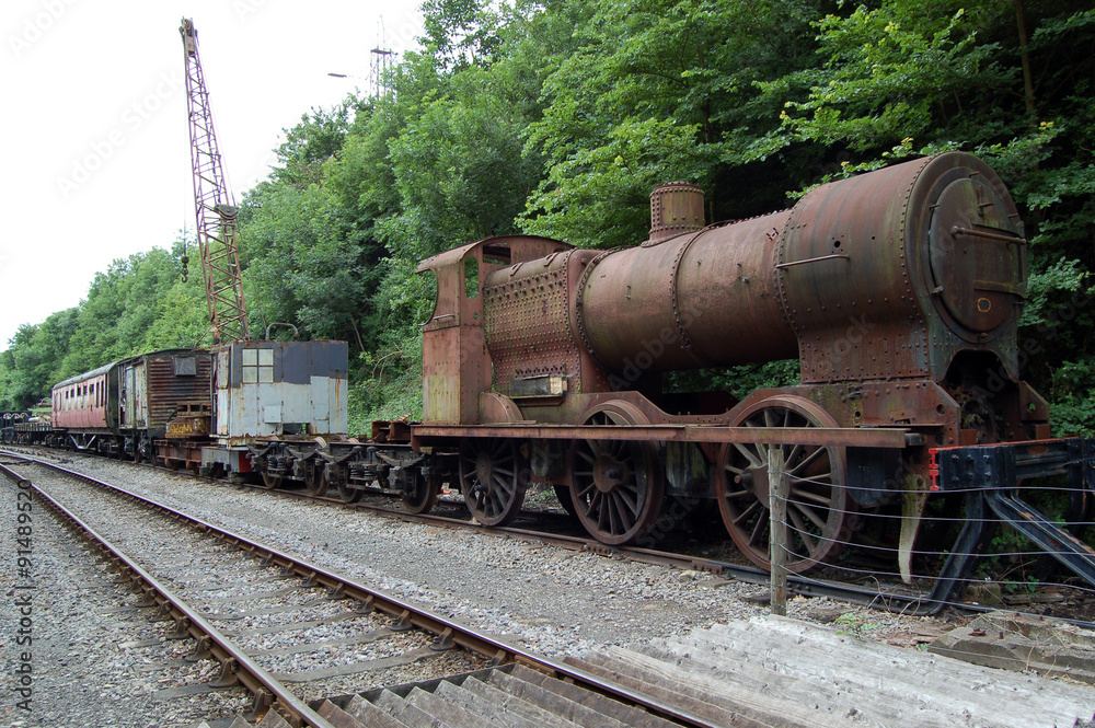 Naklejka premium Disused Steam Train and Carriage