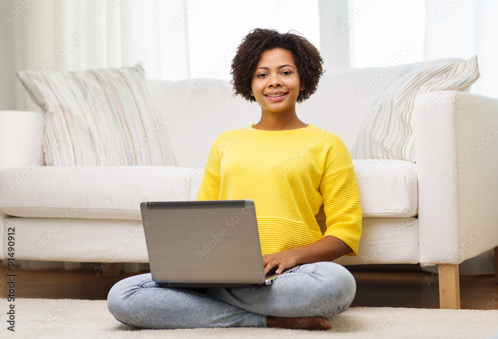 happy african american woman with laptop at home happy african american woman with laptop at home