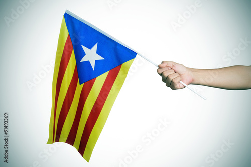 man with the Estelada, the Catalan pro-independence flag, vignet