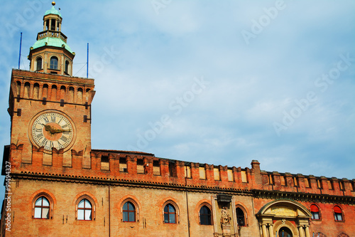 Palazzo D'Accursio under dramatic sky in Bologna photo