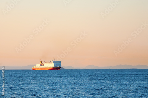 Ferry on the sea at sunset © Lars Johansson