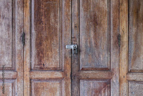 Locked door, vintage style wooden doors.