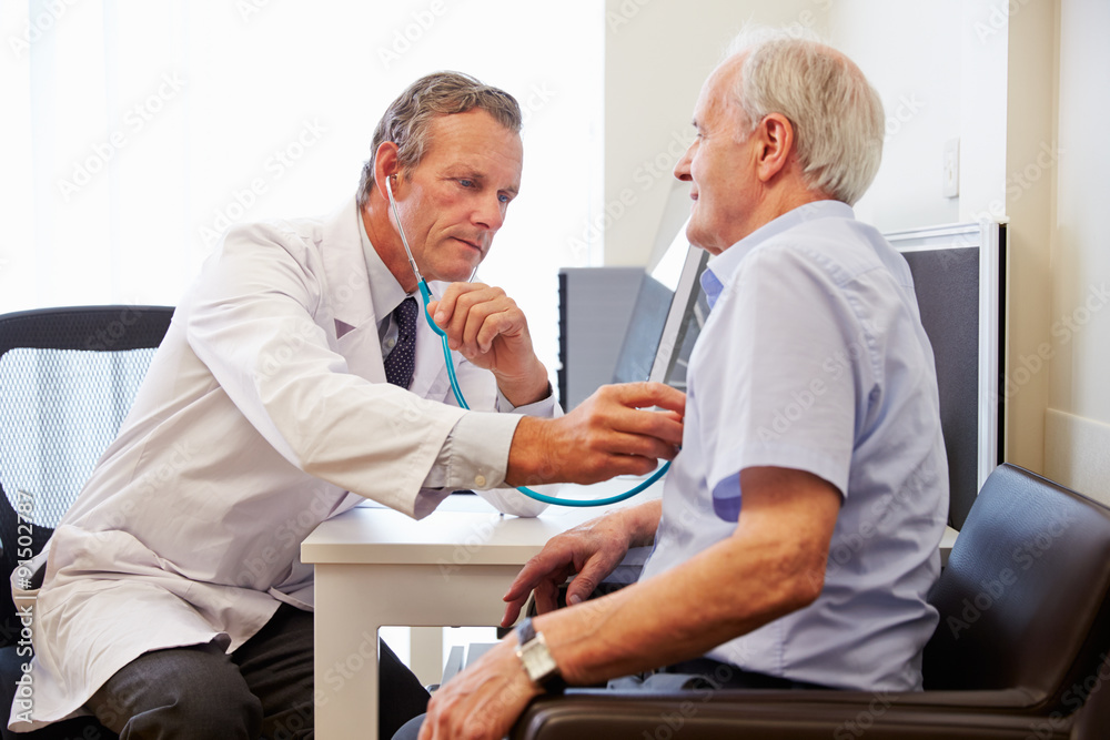 Obraz premium Senior Patient Having Medical Exam With Doctor In Office