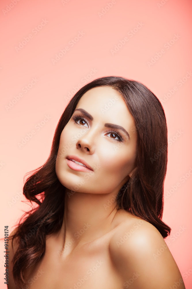 beautiful young woman looking up, on rose beautiful young woman looking up, on rose