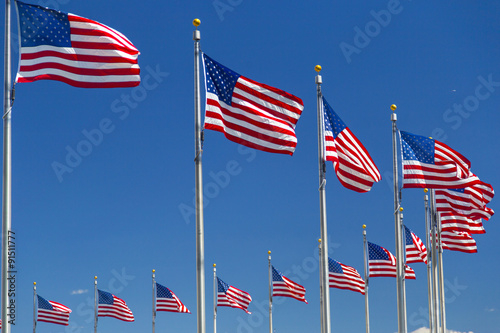 American flags near Washington monument in Washington DC