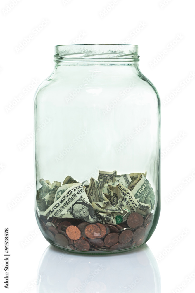 Glass jar with some money in the bottom