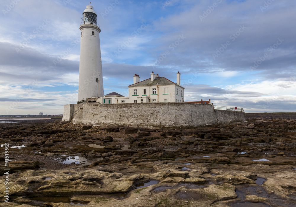 St Marys Lighthouse, Whitley Bay, North Tyneside, England, UK. In the early morning at low tide.