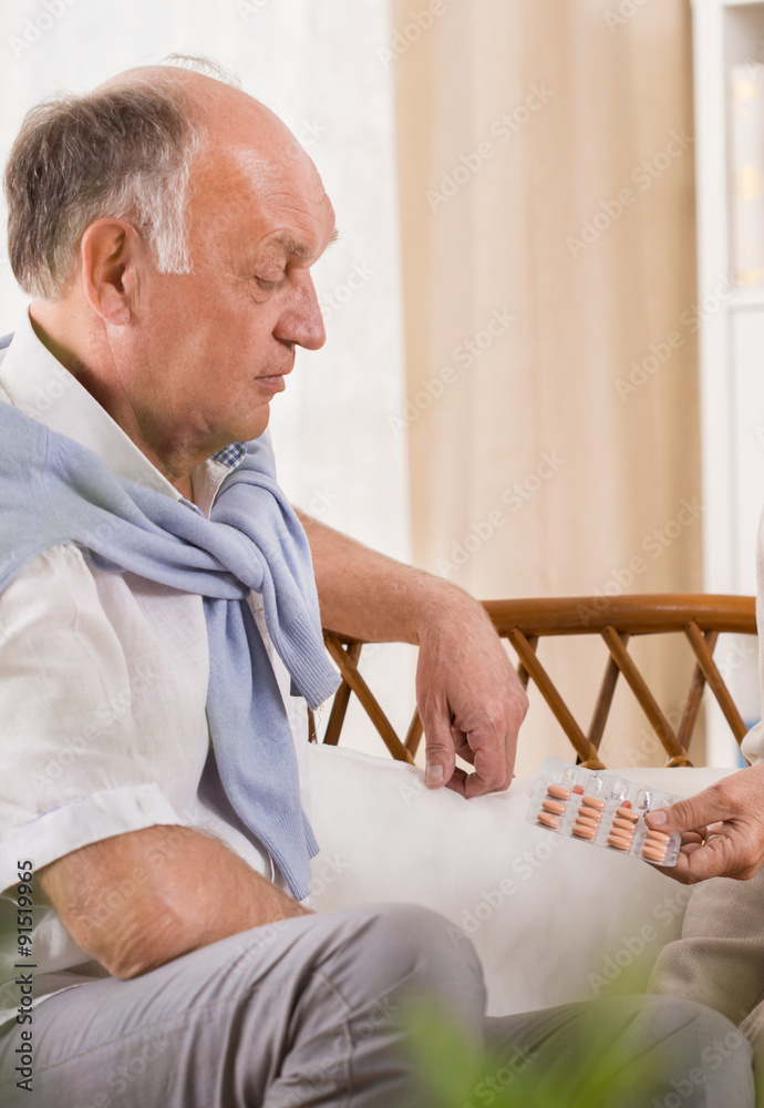 © Photographee.eu - Getting medicine from wife © Photographee.eu - Getting medicine from wife