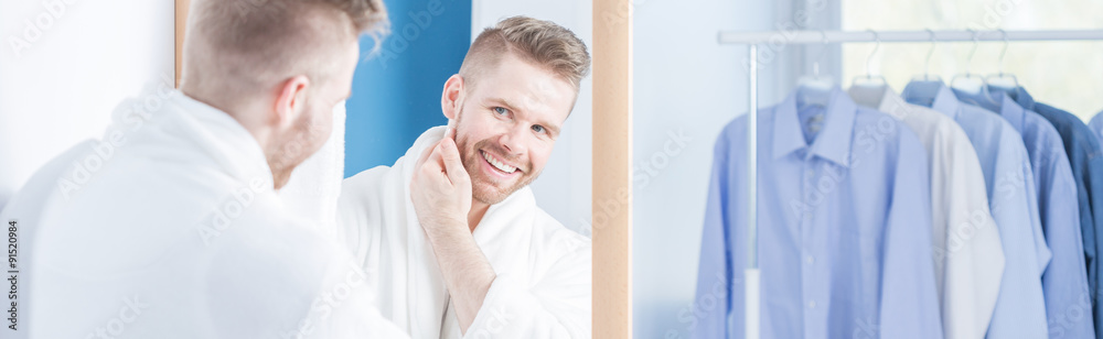 Narcissistic male checking his complexion Narcissistic male checking his complexion