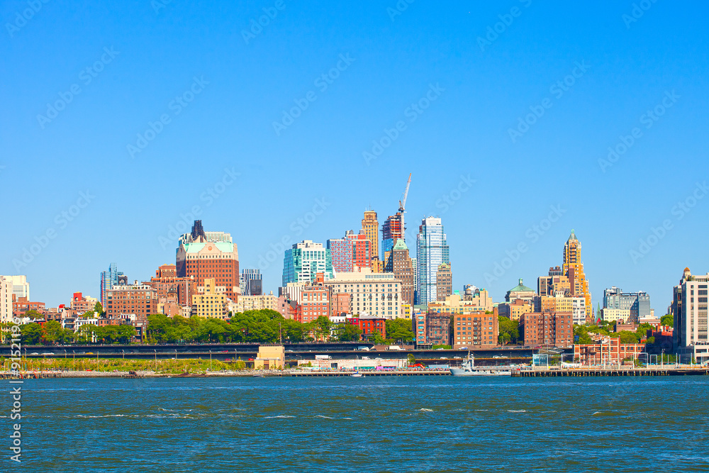 Brooklyn New York, buildings cityscape on a beautiful day with blue sky